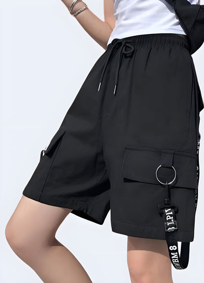 Front and side view of women's techwear shorts, highlighting the functional pockets, adjustable waistband, and versatile style for Canada fashion enthusiasts.