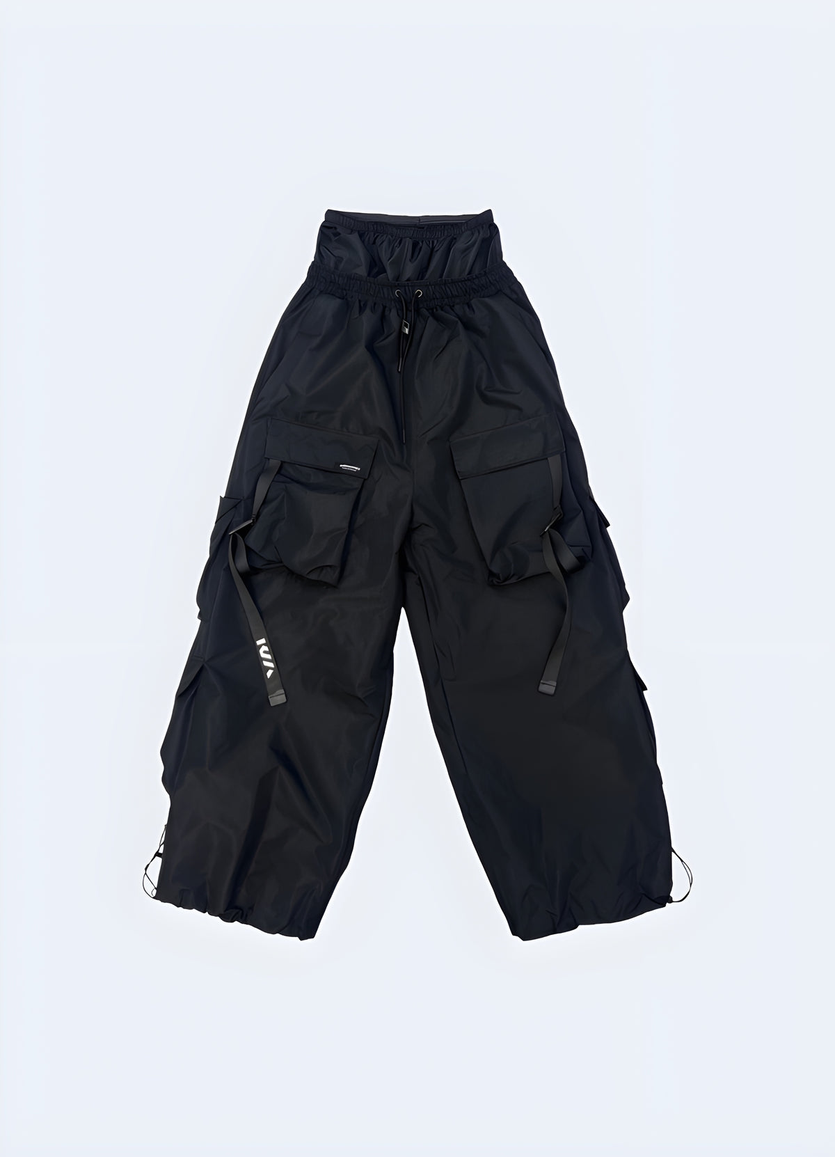 Close view of the cargo pocket and flap detail on the Techwear Ski Pants