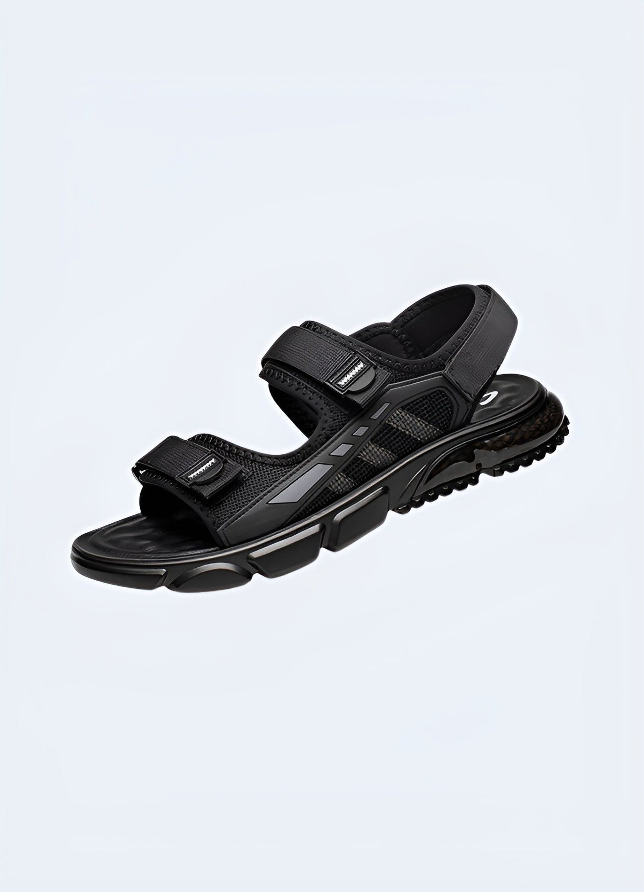 Techwear slides featuring innovative materials and futuristic design, perfect for fashion-forward individuals seeking comfortable and stylish footwear for urban environments.