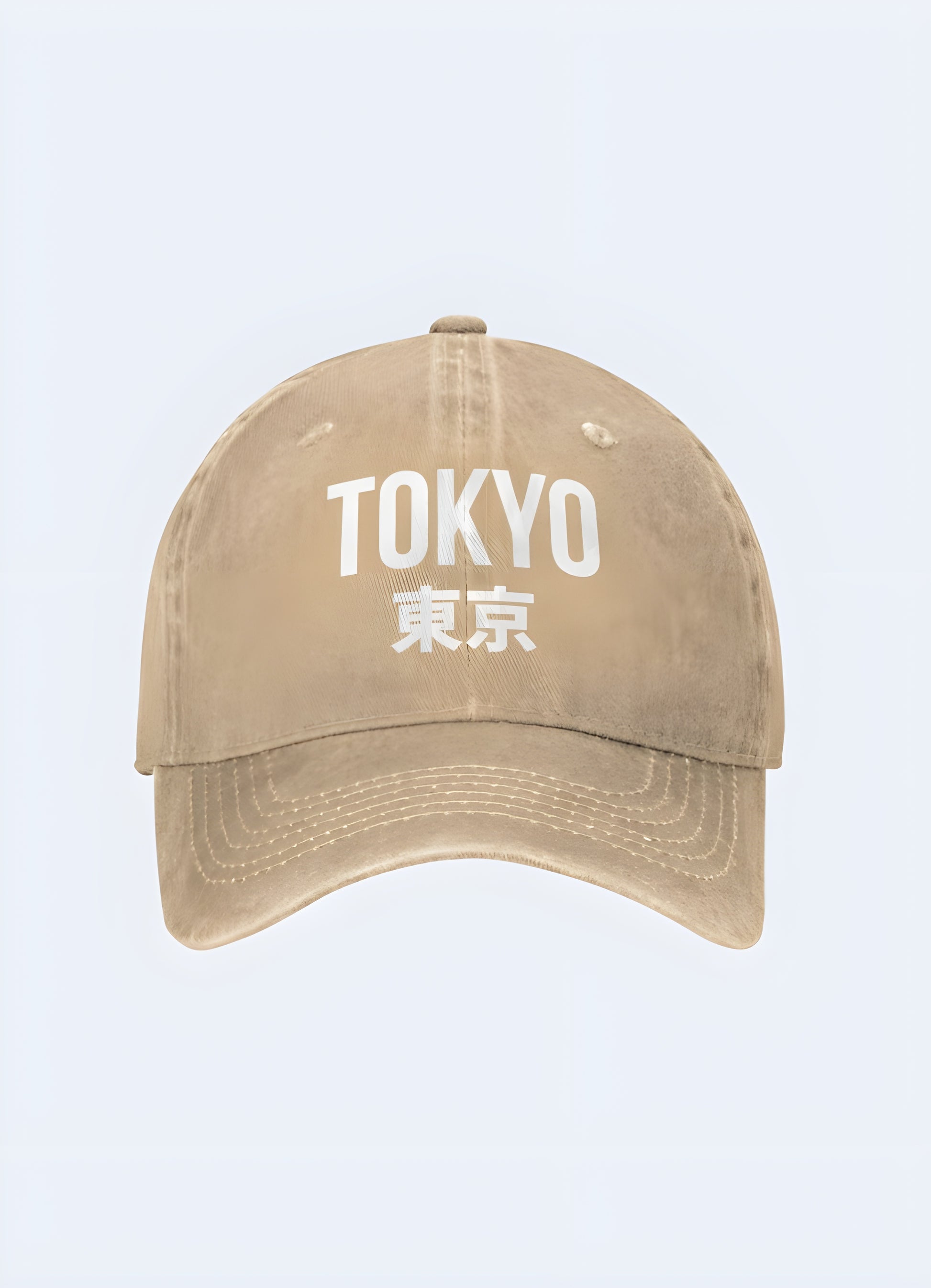 Beige Tokyo Japan trucker cap with a white logo, side view. Neutral-toned cap suitable for any casual look.