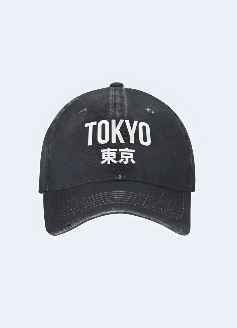 Black Tokyo Japan trucker cap with a white logo, front view. Stylish and trendy headwear for casual outfits.