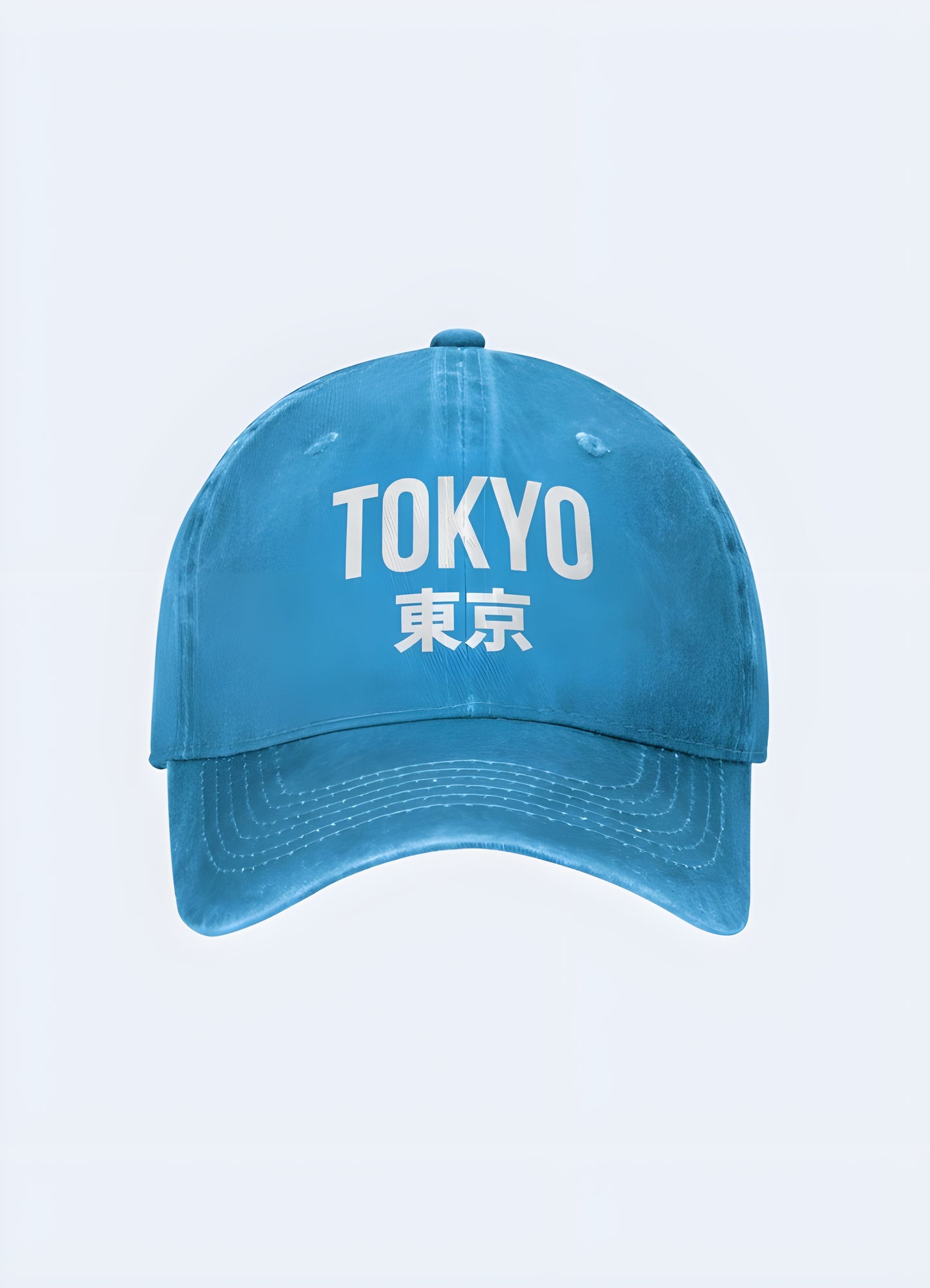 Blue Tokyo Japan trucker cap with a white logo, side view. Vibrant headgear for a bold fashion statement.