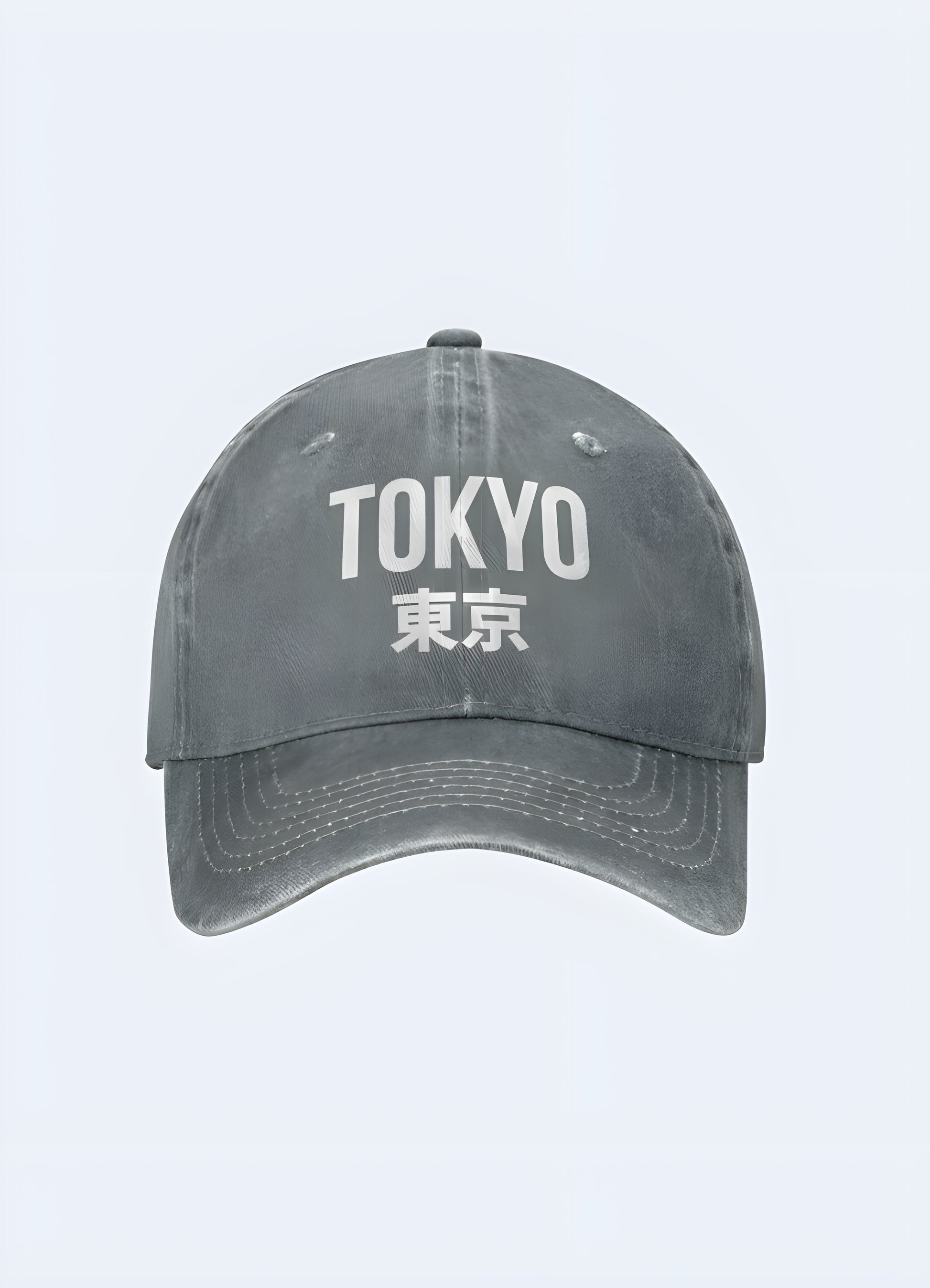 Grey Tokyo Japan trucker cap with a white logo, side view. Versatile and modern cap for everyday wear.