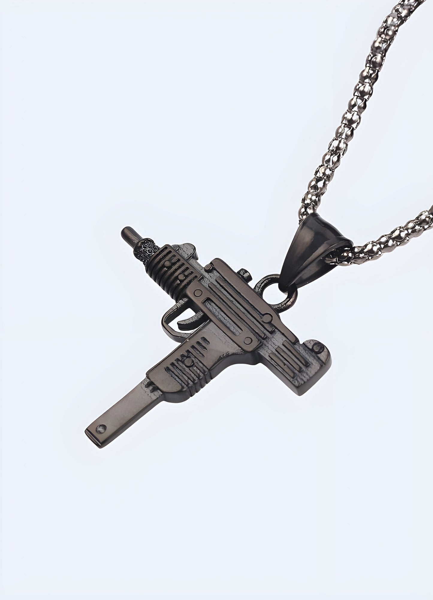 Uzi necklace displayed from the front view, with a detailed pendant representing the classic firearm Canada.