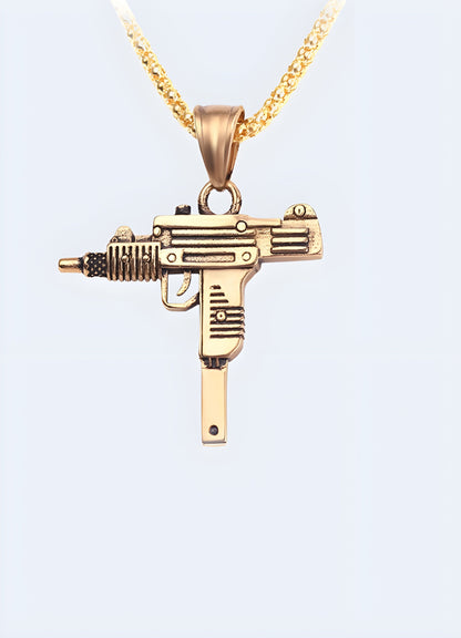 Gold Uzi necklace displayed from the front view, showcasing a pendant designed to resemble the famous firearm Canada.