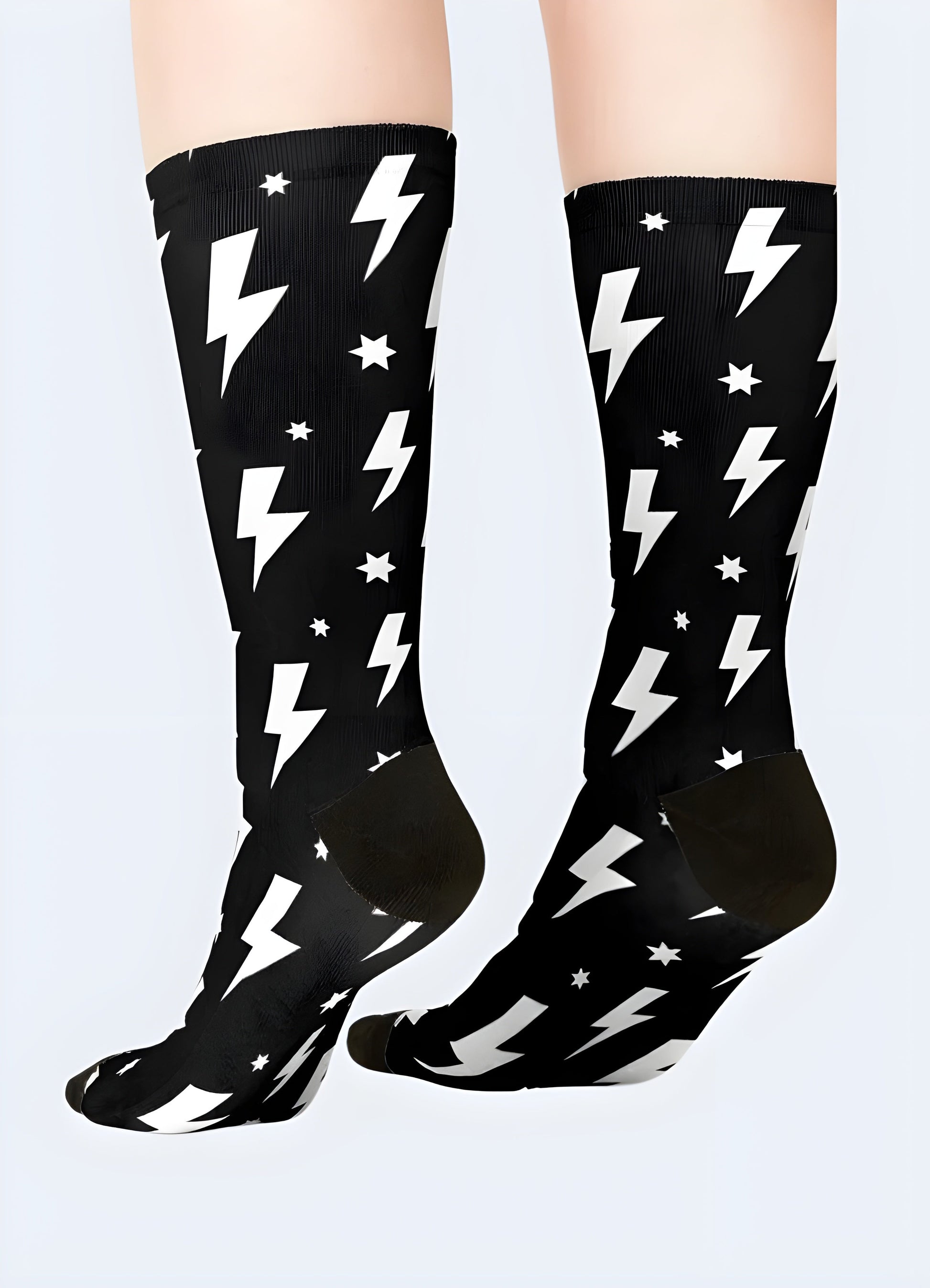 Rear view of a wearing fashionable socks adorned with a dynamic lightning bolt print, highlighting the unique design Canada. 