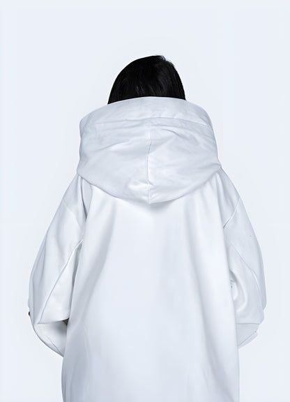 Back view of a woman wearing a white women's techwear jacket, showcasing its clean design and practical features for city life in the Canada.