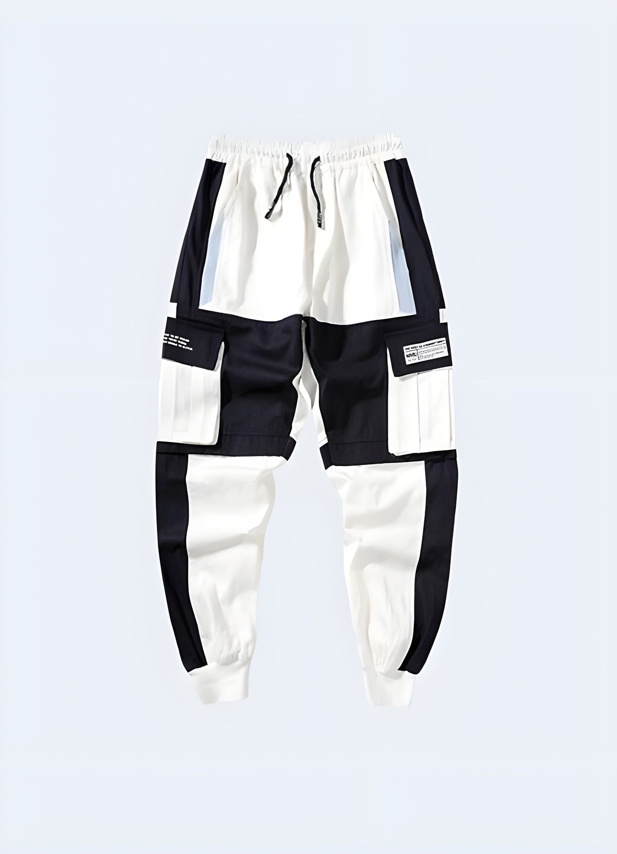 Close detail of the white techwear pants pocket and hem finish