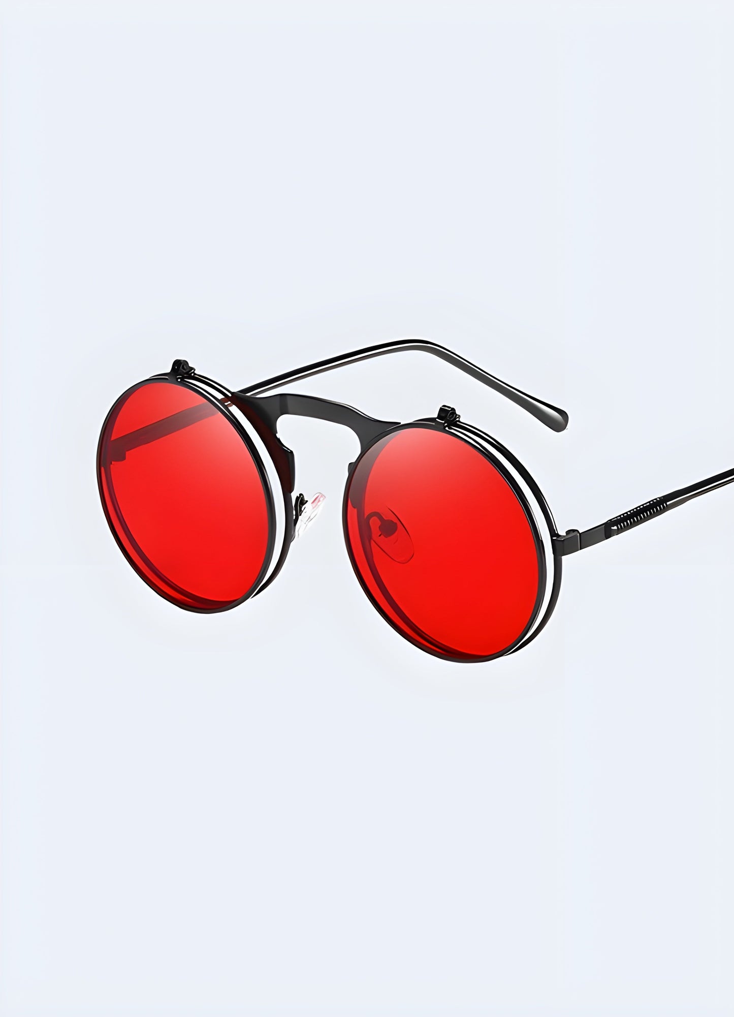 A front-side view of wild west sunglasses with red lenses, highlighting their bold and eye-catching style Canada.