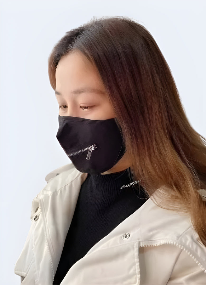 A woman wearing a Scarlxrd zipper mask, shown from the front view, emphasizing the mask's unique design with its prominent zipper feature Canada.