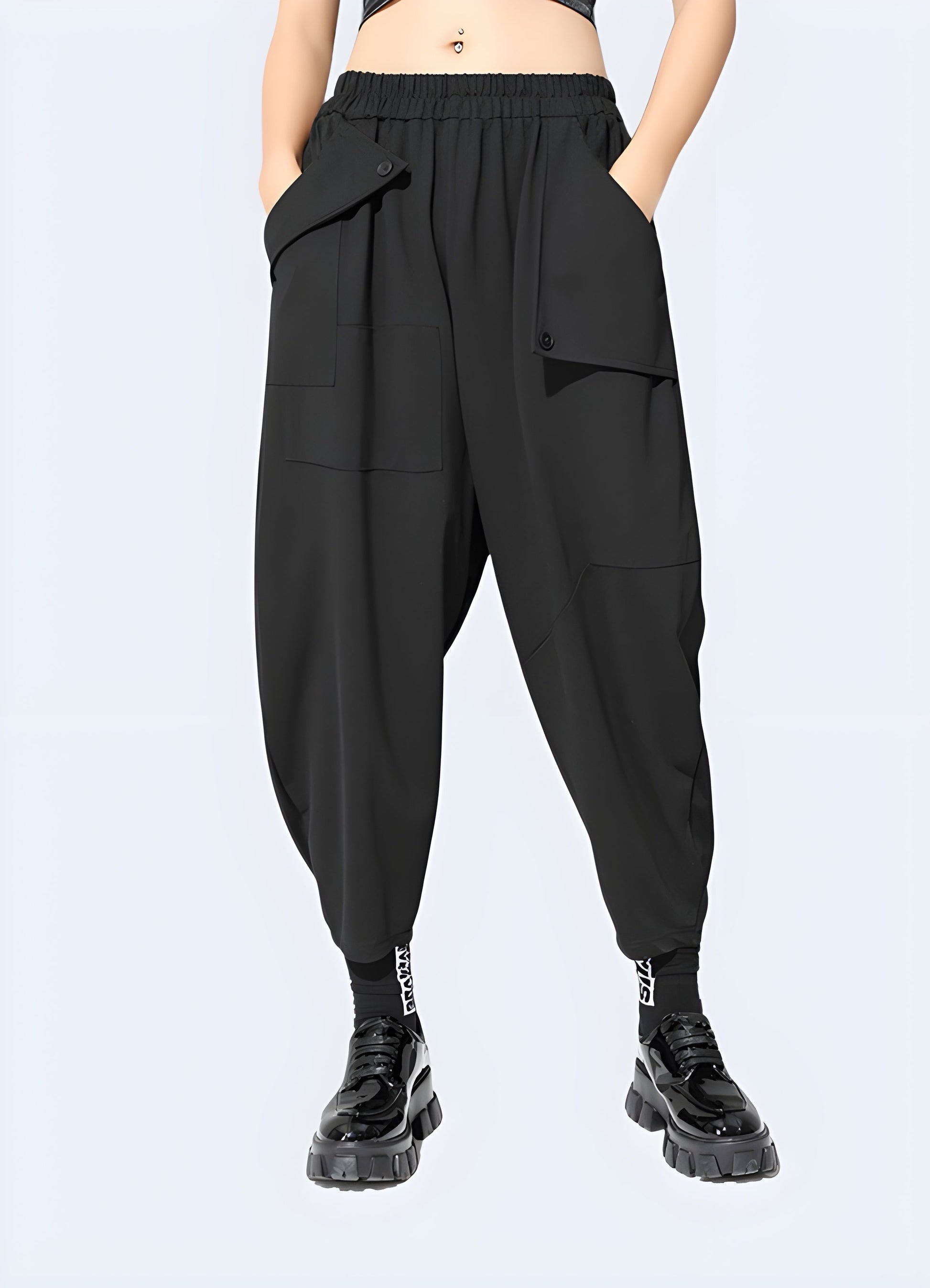 Front side view of a woman wearing women's techwear harem pants, showcasing the trendy and loose-fitting design popular among Canada fashion