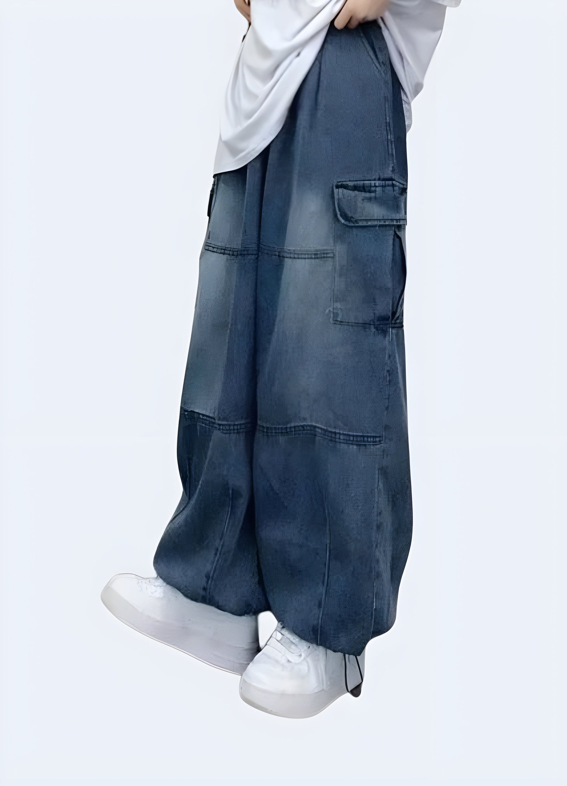 Side view of a woman modeling trendy blue baggy cargo pants, emphasizing the relaxed fit and versatile style, available for Canada customers.