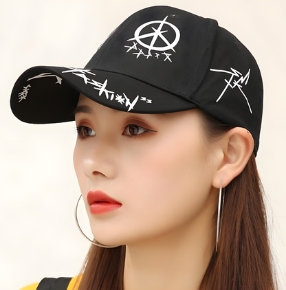 The image depicts a woman wearing a black gothic-style hat, viewed from a front-side angle.