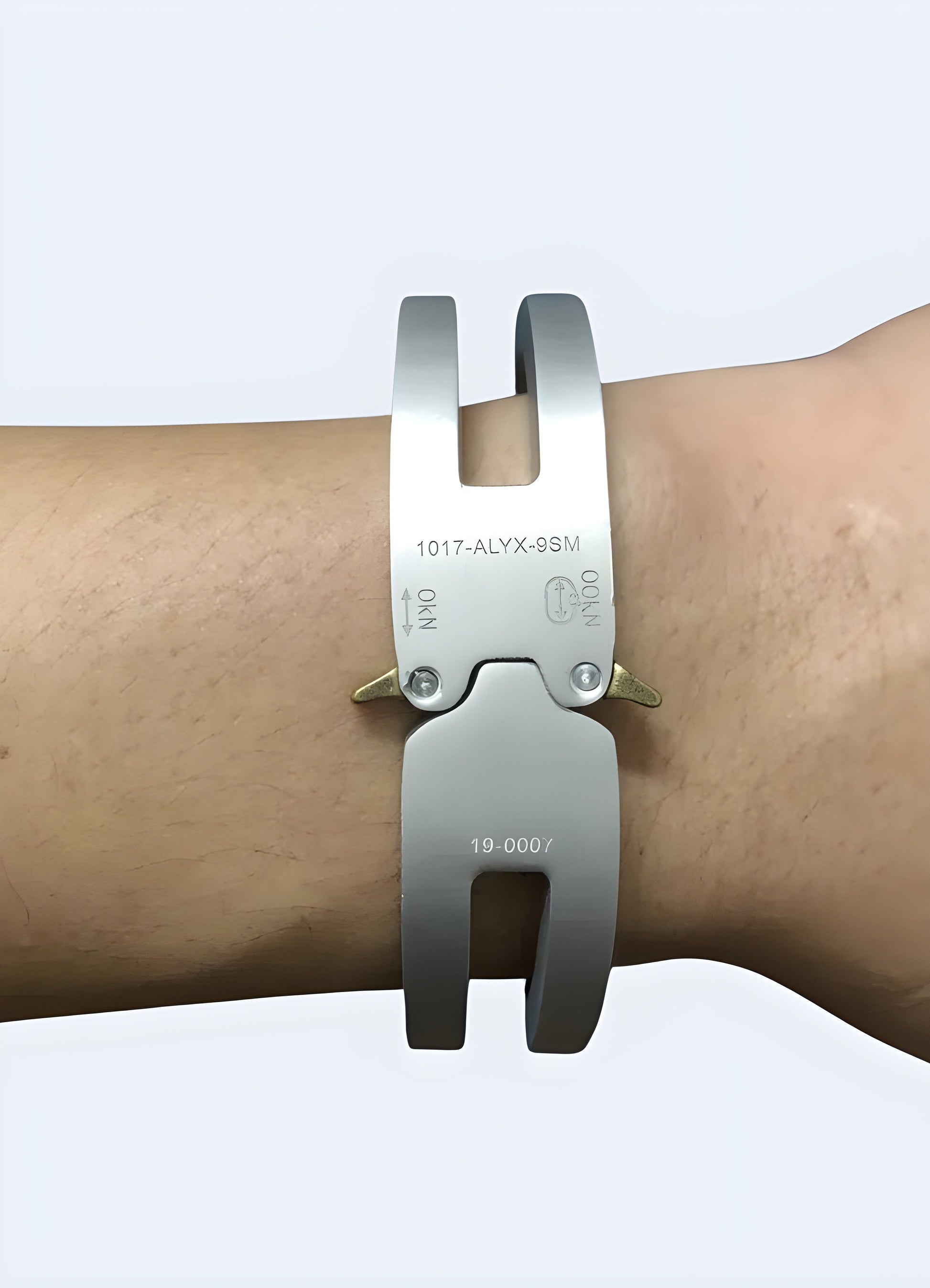 Woman wearing a cyberpunk bracelet in silver, front view, showcasing a chic and edgy design, available in the Canada.