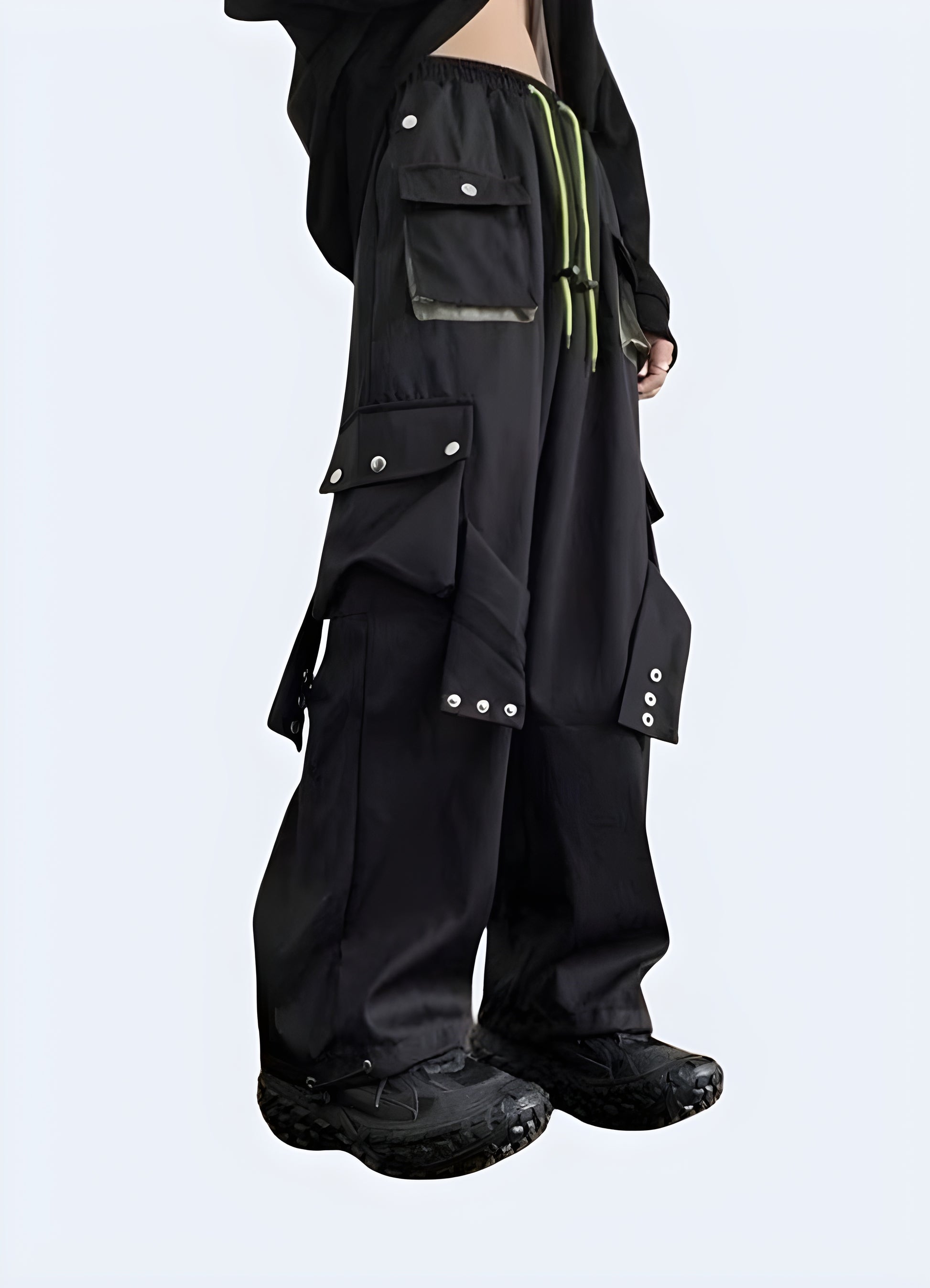 Woman modeling darkwear baggy pants woman, showcasing the sleek design and practical features in a left side view, ideal for Canada customers.