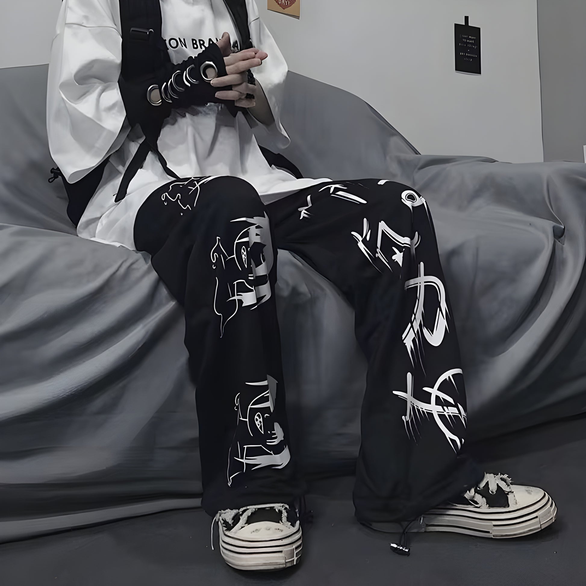 Model view of a woman wearing trendy Japanese-style baggy pants, showcasing the loose fit and unique design popular among Canada fashion enthusiasts.