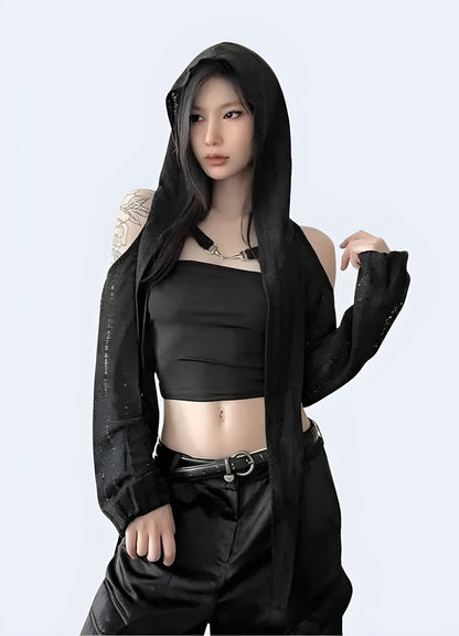 Front view of a woman wearing a techwear women's darkwear hood crop top, showcasing contemporary street style in Canada.