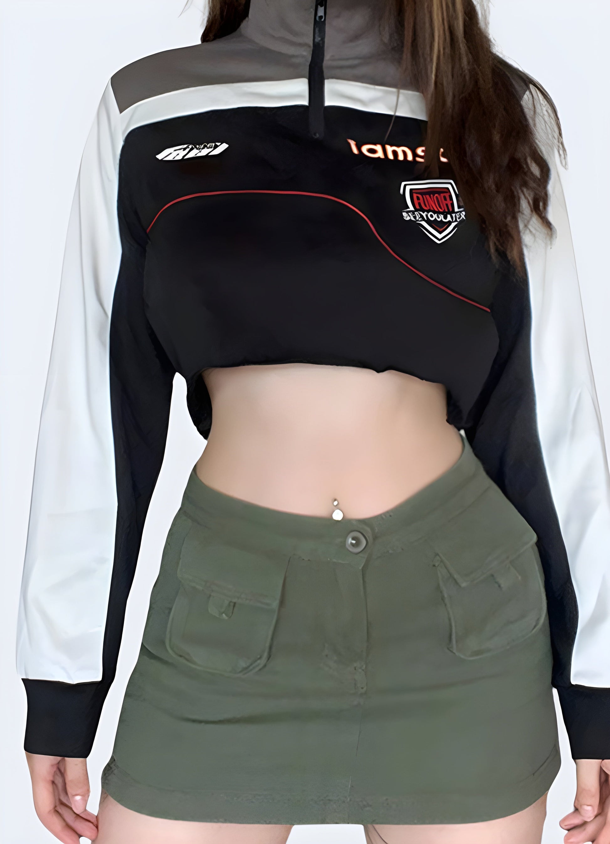 Front view of a woman wearing a techwear motorcycle pullover crop top, showcasing modern urban fashion in Canada.