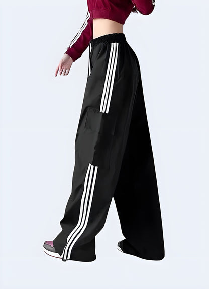 Side view of a woman wearing women's techwear streetwear pants, showcasing the trendy and practical design popular among Canada fashion enthusiasts.