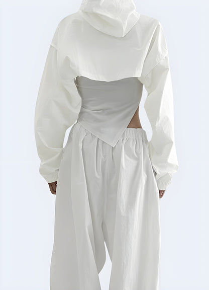 Back view of a woman sporting a white turtleneck crop top, highlighting its versatile style and ability to elevate any outfit in the Canada fashion scene.