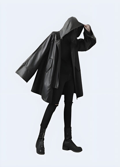 Front view of a woman sporting a women's waterproof rain jacket, highlighting its functionality and fashionable look for rainy days in the Canada.