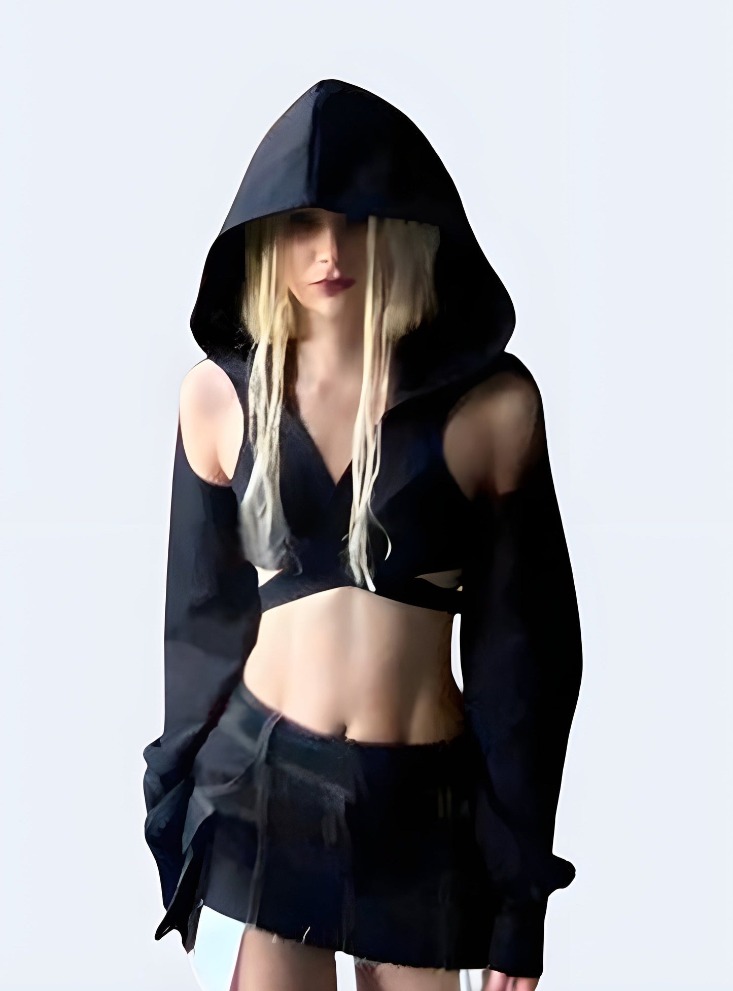 Edgy women's darkwear hooded crop top, combining dark aesthetics with a modern silhouette for a bold fashion statement in the Canada alternative scene.