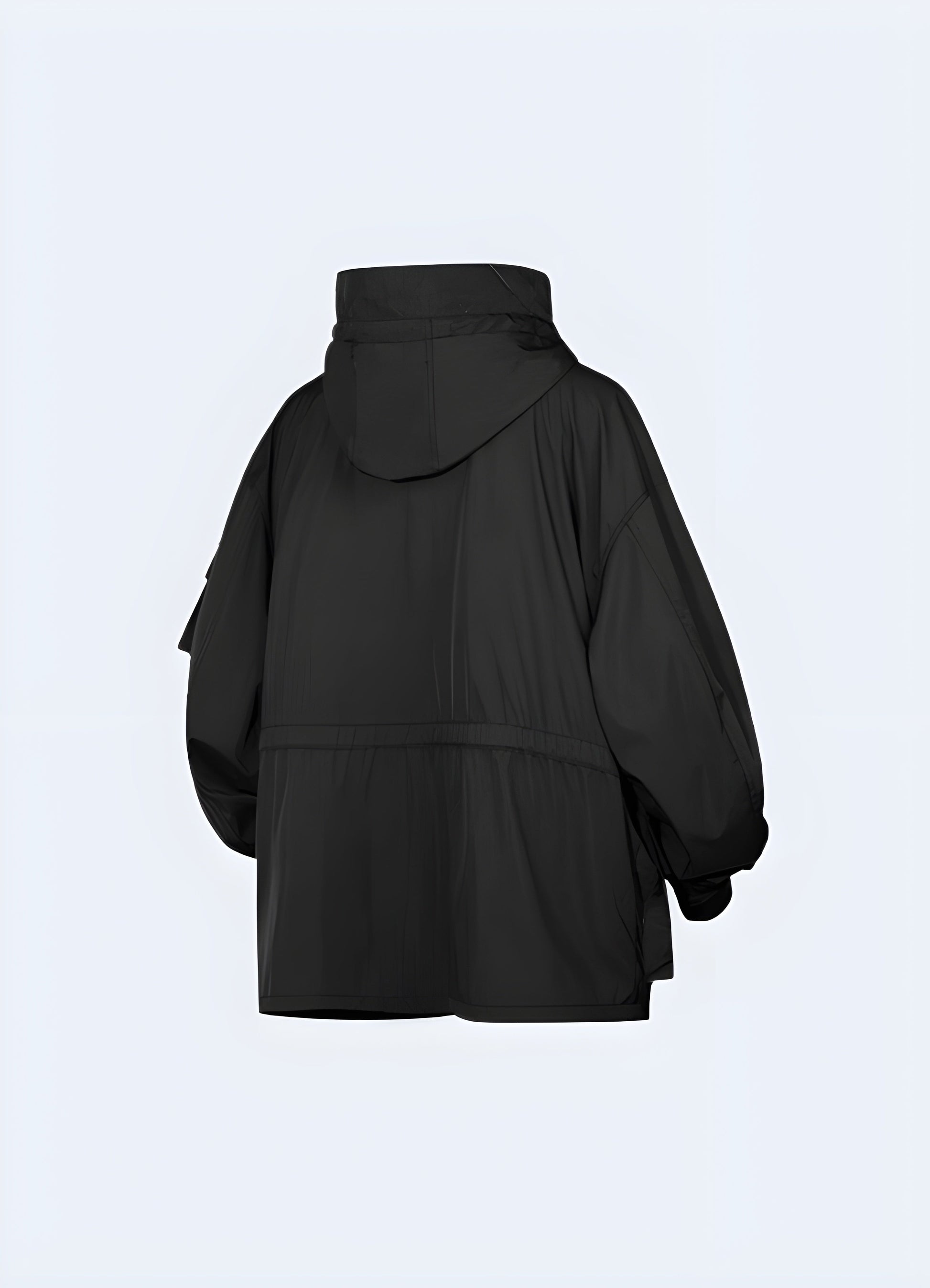 Back view of a women's techwear parka, emphasizing its high-quality construction and practical details for navigating the Canada urban landscape in style.