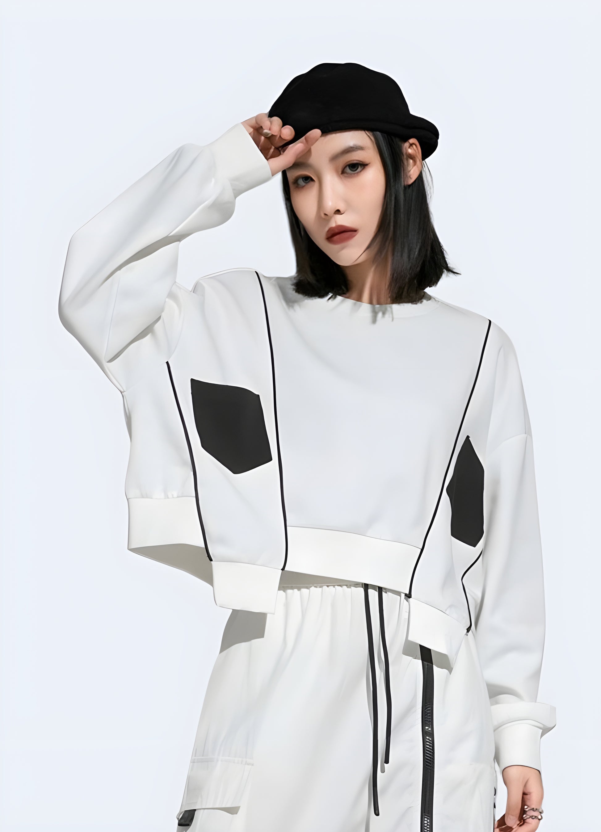 Women's techwear white crop sweatshirt in Canada, featuring a trendy and contemporary style.